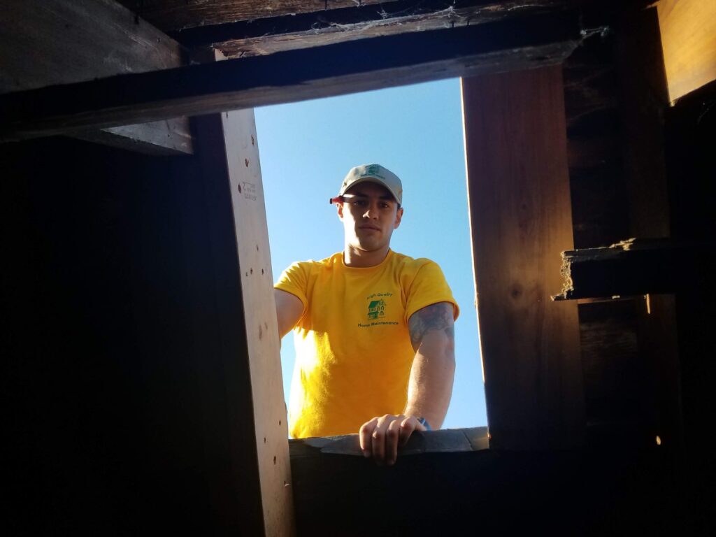 home maintenance cedar rapids technician inspecting window frame